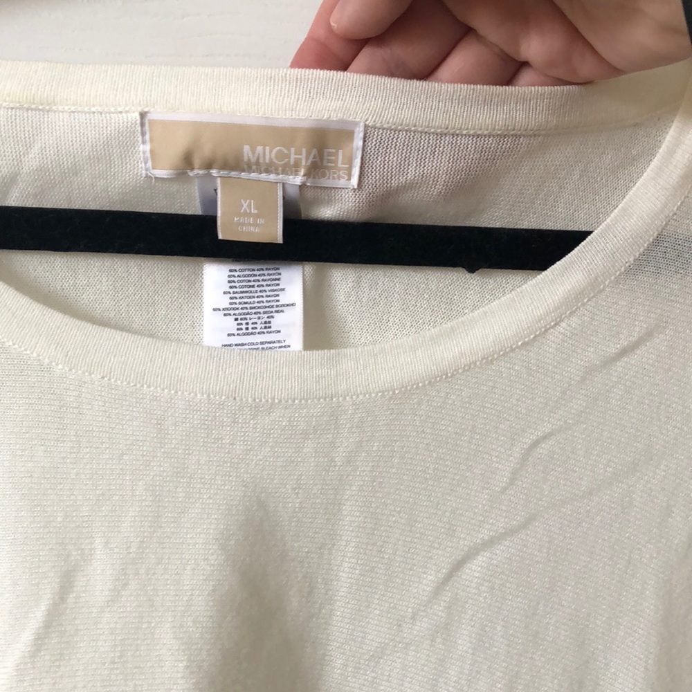 Michael Kora top